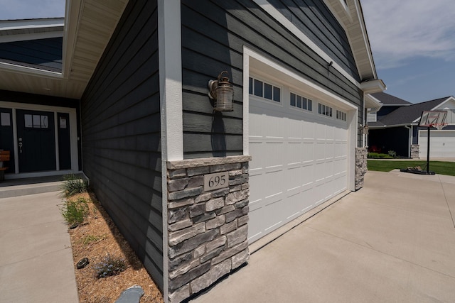 695 Marcus Pl NE, Byron, MN 55920 - garage with concrete driveway
