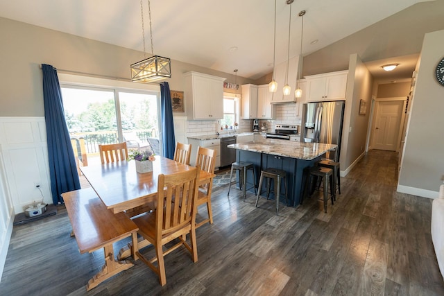 695 Marcus Pl NE, Byron, MN 55920 - dining space featuring lofted ceiling and dark wood-style floors