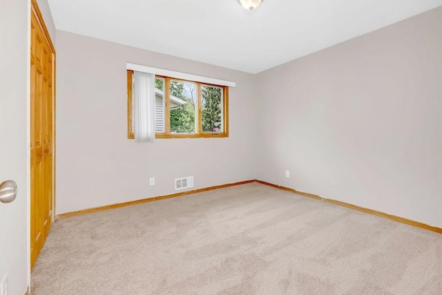1420 17th St W, Hastings, MN 55033 - spare room with light colored carpet and baseboards
