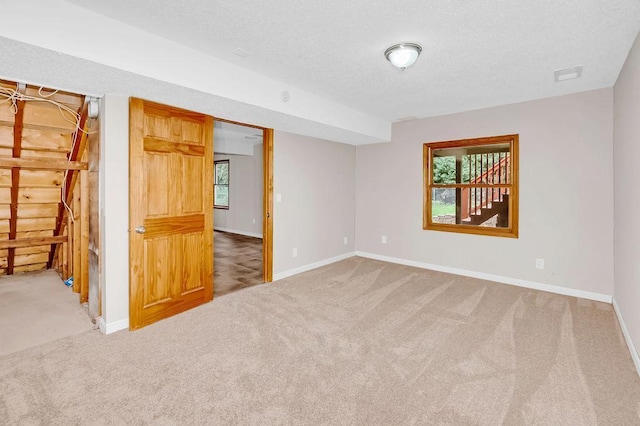1420 17th St W, Hastings, MN 55033 - spare room with carpet floors and a textured ceiling