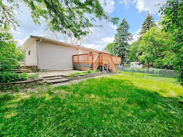 1420 17th St W, Hastings, MN 55033 - rear view of property featuring stairway, a deck, and a fenced backyard