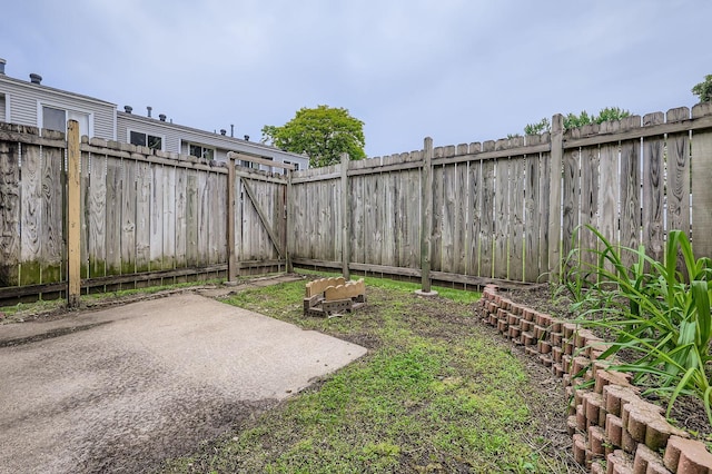 455 107th Ln NW, Coon Rapids, MN 55448 - fenced backyard with a patio