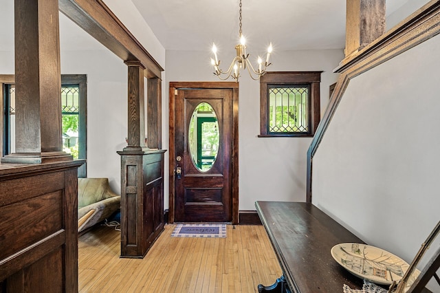 3231 41st Ave S, Minneapolis, MN 55406 - foyer entrance featuring a chandelier and light wood-style floors