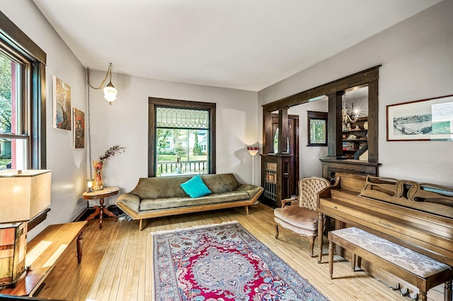 3231 41st Ave S, Minneapolis, MN 55406 - living area featuring hardwood / wood-style floors and ornate columns