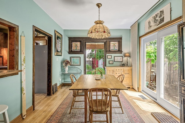 3231 41st Ave S, Minneapolis, MN 55406 - dining space featuring light wood-style floors and baseboards