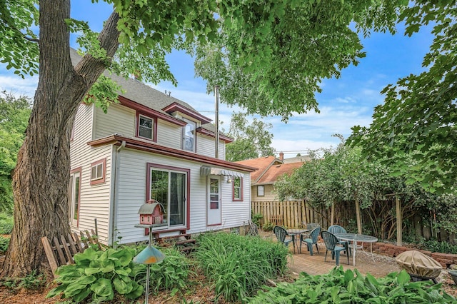 3231 41st Ave S, Minneapolis, MN 55406 - back of property featuring a patio area and outdoor dining space