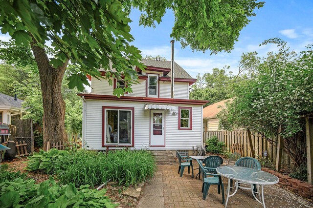 3231 41st Ave S, Minneapolis, MN 55406 - rear view of house featuring a patio area