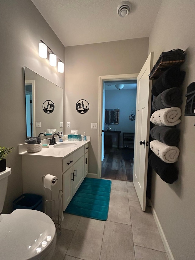 8756 151st Ave NW, Ramsey, MN 55303 - bathroom with vanity and tile patterned floors