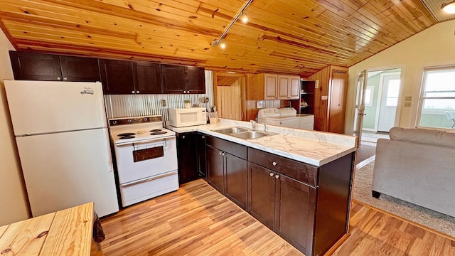 12833 Twilight Rd, South Harbor Twp, MN 56359 - kitchen featuring white appliances, washer and dryer, light wood-style flooring, dark brown cabinets, and light countertops