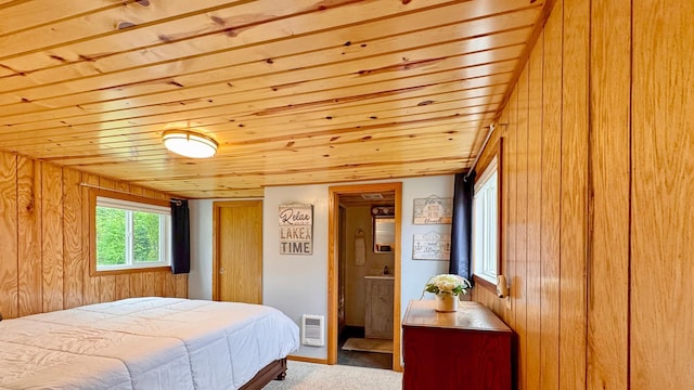 12833 Twilight Rd, South Harbor Twp, MN 56359 - bedroom with wood ceiling, carpet flooring, and wooden walls
