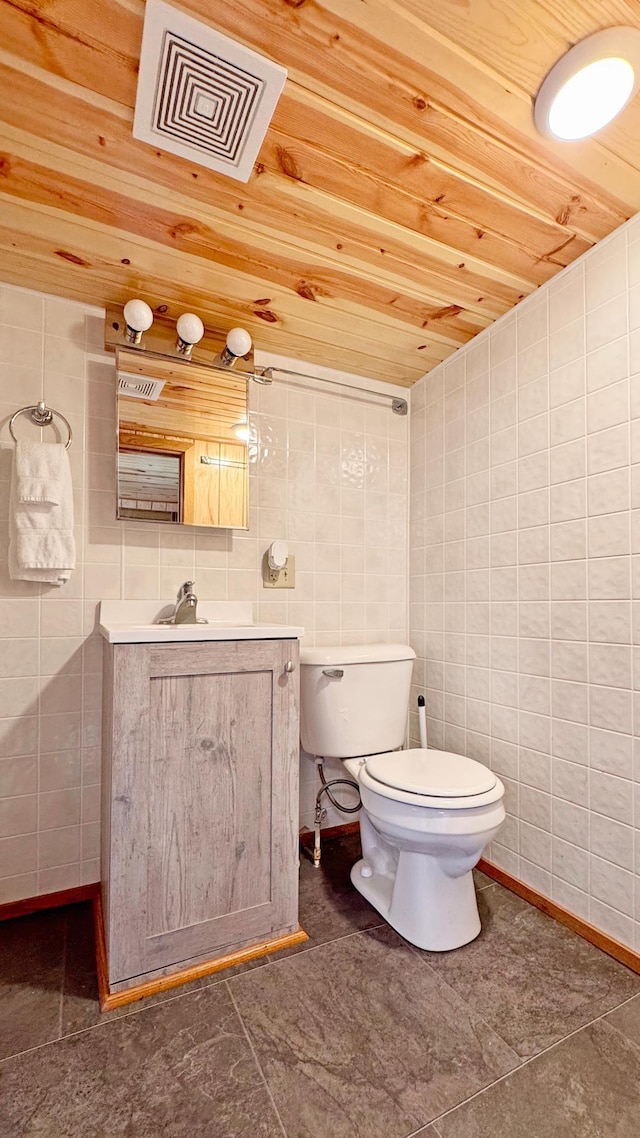 12833 Twilight Rd, South Harbor Twp, MN 56359 - half bath with tile walls, vanity, and wooden ceiling