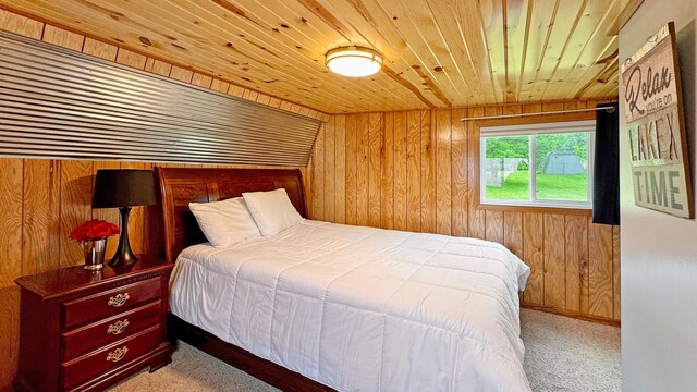 12833 Twilight Rd, South Harbor Twp, MN 56359 - bedroom with wood ceiling, wood walls, and carpet