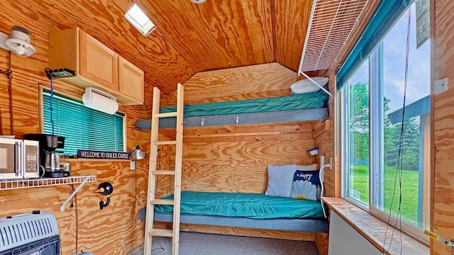 12833 Twilight Rd, South Harbor Twp, MN 56359 - carpeted bedroom with wooden ceiling, wood walls, and heating unit