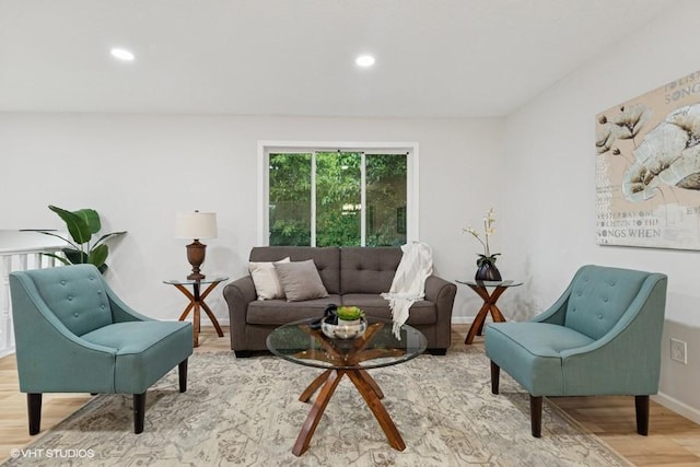 9019 Idaho Ave N, Brooklyn Park, MN 55445 - living room featuring light wood-type flooring and recessed lighting