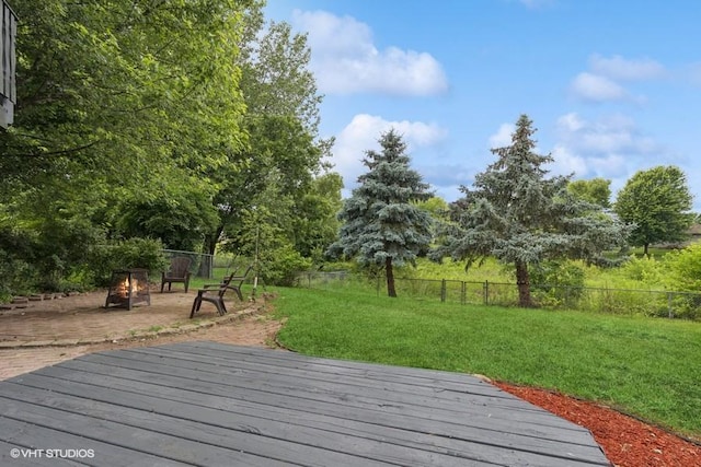 9019 Idaho Ave N, Brooklyn Park, MN 55445 - wooden deck with a fire pit
