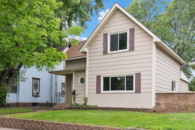 724 Pierce St NE, Minneapolis, MN 55413 - view of front of house with roof with shingles