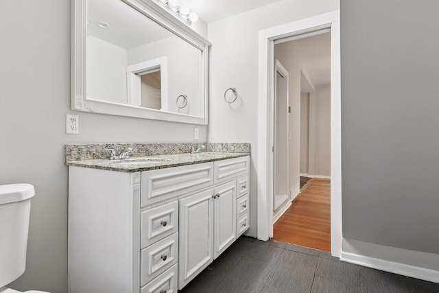 724 Pierce St NE, Minneapolis, MN 55413 - bathroom with toilet and double vanity