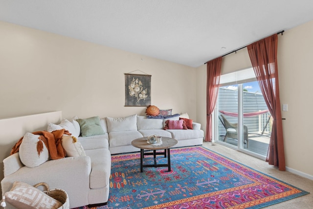 8468 Gateway Cir, Monticello, MN 55362 - carpeted living area featuring baseboards