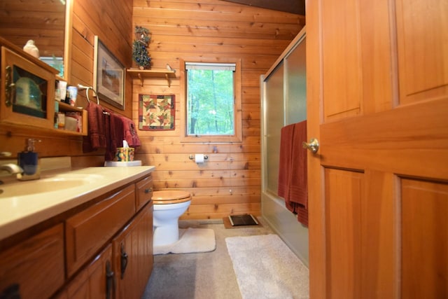 28716 Kilkare Rd, Danbury, WI 54830 - bathroom with wood walls, vanity, and combined bath / shower with glass door