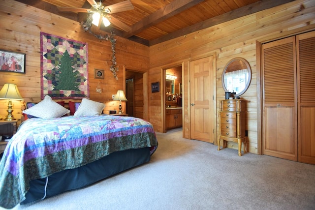 28716 Kilkare Rd, Danbury, WI 54830 - bedroom with wood walls, light colored carpet, and a wooden ceiling with exposed beams