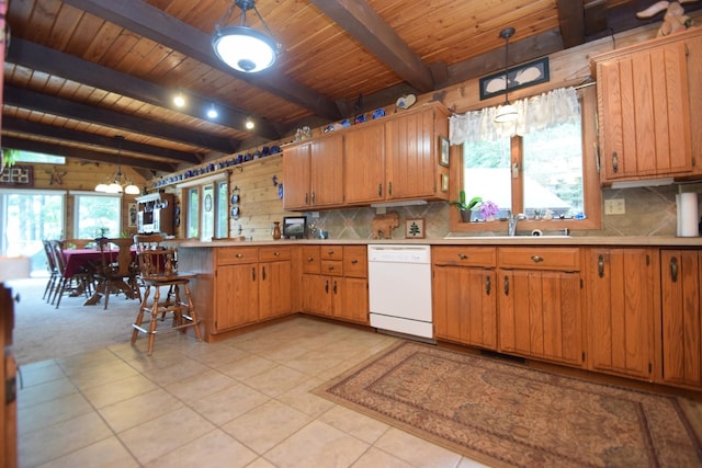28716 Kilkare Rd, Danbury, WI 54830 - kitchen featuring dishwasher, a peninsula, decorative backsplash, a wooden ceiling with exposed beams, and light countertops