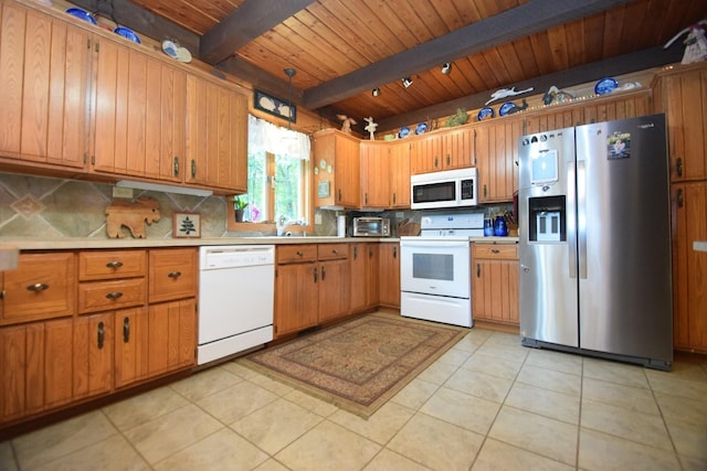 28716 Kilkare Rd, Danbury, WI 54830 - kitchen featuring white appliances, a wooden ceiling with exposed beams, tasteful backsplash, light countertops, and brown cabinetry