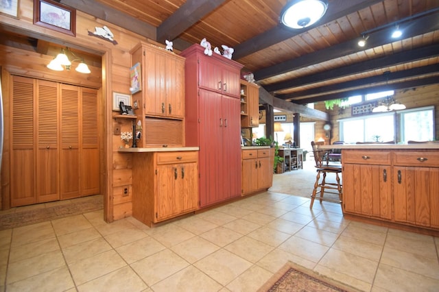 28716 Kilkare Rd, Danbury, WI 54830 - kitchen featuring open shelves, a wood ceiling with exposed beams, a chandelier, light countertops, and light tile patterned flooring
