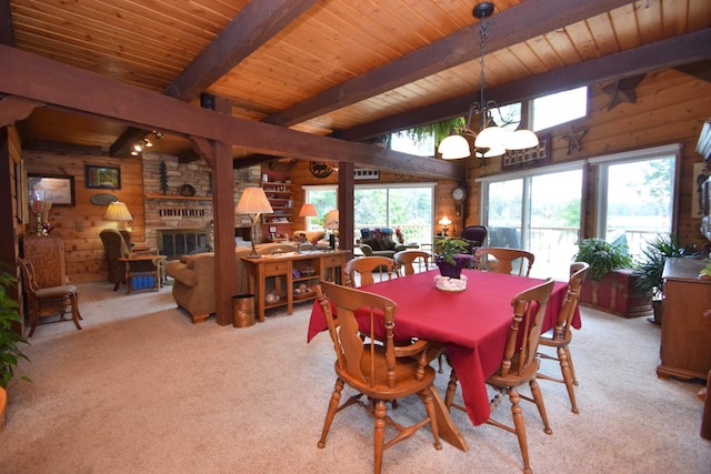 28716 Kilkare Rd, Danbury, WI 54830 - dining area featuring wooden walls, a wood ceiling with exposed beams, light carpet, and a chandelier