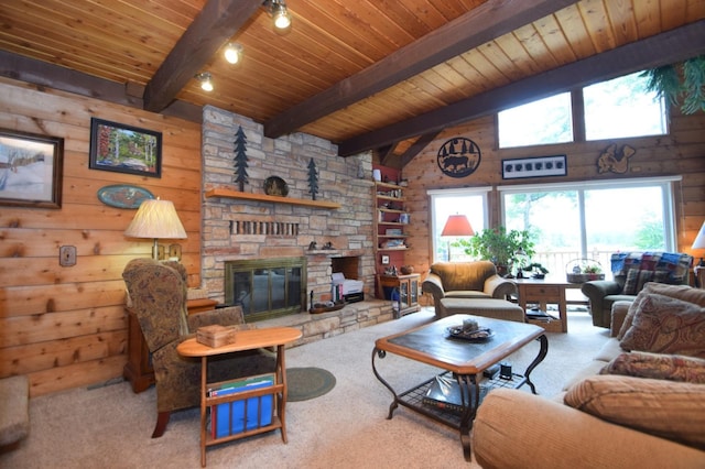 28716 Kilkare Rd, Danbury, WI 54830 - living area with wood walls, wooden ceiling, carpet flooring, and a stone fireplace