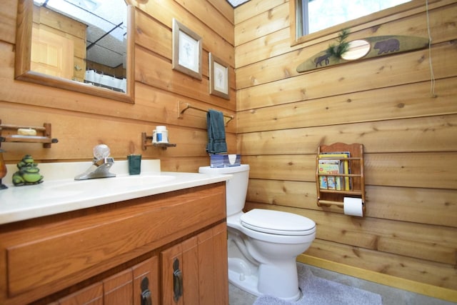 28716 Kilkare Rd, Danbury, WI 54830 - bathroom with vanity and wood walls