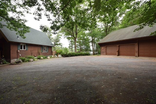 28716 Kilkare Rd, Danbury, WI 54830 - view of home's exterior featuring roof with shingles