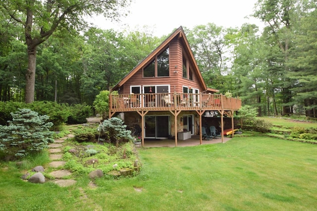 28716 Kilkare Rd, Danbury, WI 54830 - back of property with a patio area, a deck, and a lawn
