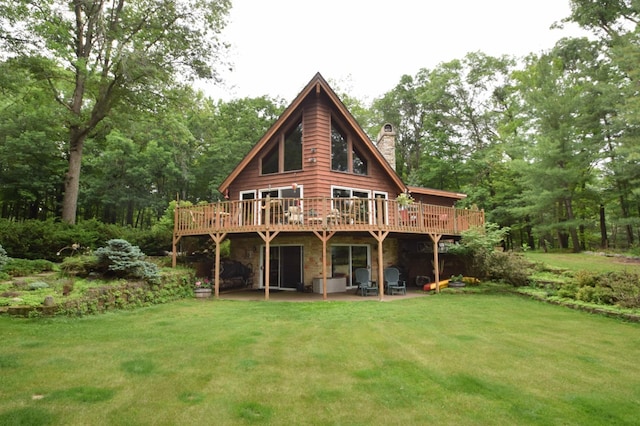 28716 Kilkare Rd, Danbury, WI 54830 - back of house featuring a chimney, a deck, and a yard