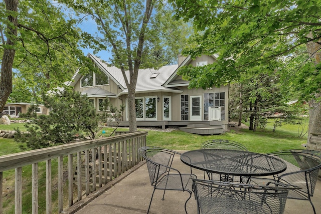 13188 Chicago Club Ln NE, Alexandria, MN 56308 - view of patio with a deck and outdoor dining area