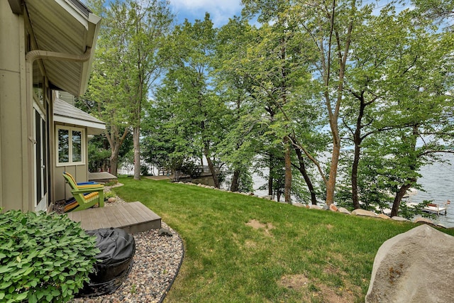 13188 Chicago Club Ln NE, Alexandria, MN 56308 - view of green lawn featuring a deck with water view