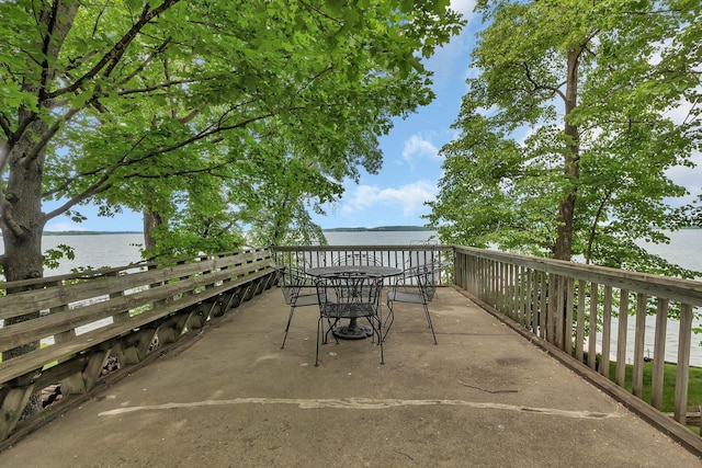 13188 Chicago Club Ln NE, Alexandria, MN 56308 - view of patio featuring a water view and outdoor dining space