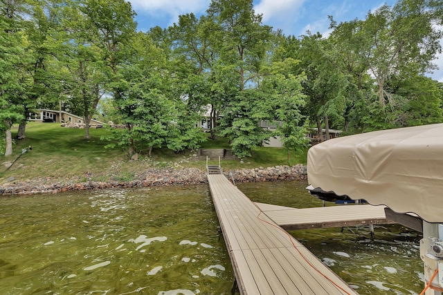 13188 Chicago Club Ln NE, Alexandria, MN 56308 - dock featuring view of scattered trees, a water view, and a lawn