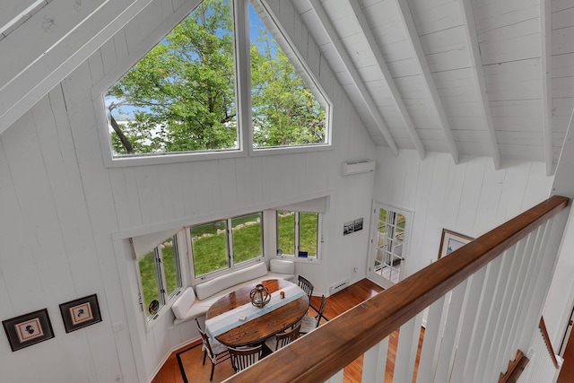 13188 Chicago Club Ln NE, Alexandria, MN 56308 - staircase featuring wooden ceiling, wood finished floors, baseboard heating, and wood walls