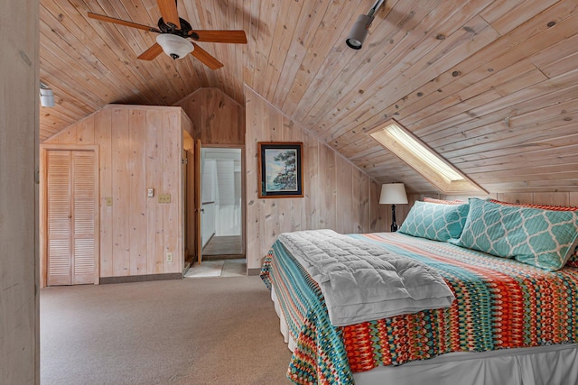 13188 Chicago Club Ln NE, Alexandria, MN 56308 - carpeted bedroom with vaulted ceiling, wood walls, wood ceiling, a skylight, and a ceiling fan