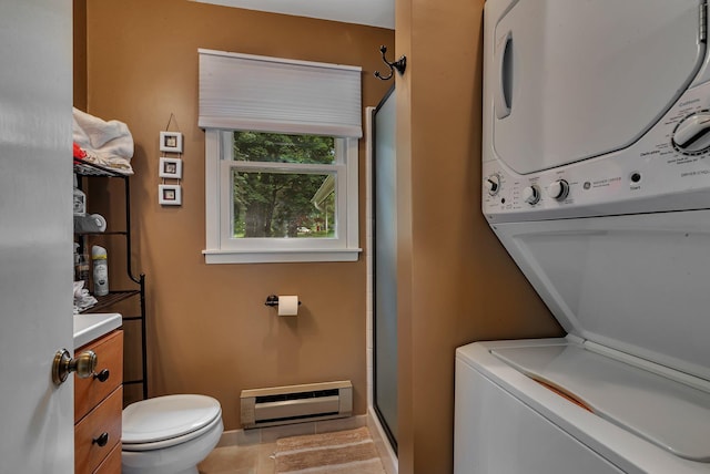 13188 Chicago Club Ln NE, Alexandria, MN 56308 - laundry room featuring stacked washer / drying machine and baseboard heating