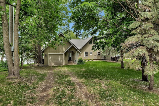 13188 Chicago Club Ln NE, Alexandria, MN 56308 - view of front of home featuring driveway, an attached garage, a front lawn, and board and batten siding