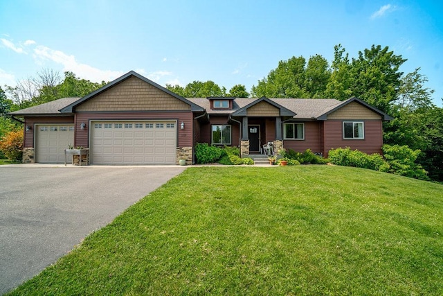 1115 Timber Path, Menomonie, WI 54751 - craftsman inspired home with stone siding, a garage, asphalt driveway, and a front lawn