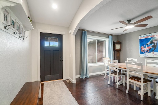 1115 Timber Path, Menomonie, WI 54751 - entrance foyer featuring arched walkways, ceiling fan, healthy amount of natural light, and wood finished floors