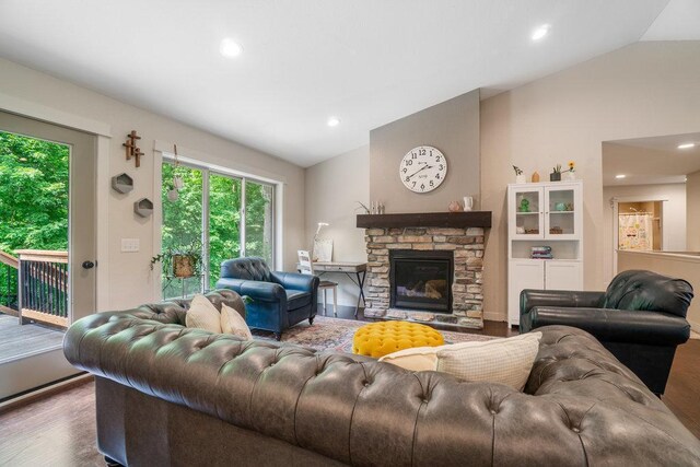 1115 Timber Path, Menomonie, WI 54751 - living area featuring vaulted ceiling, wood finished floors, recessed lighting, and a fireplace