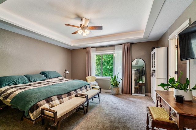 1115 Timber Path, Menomonie, WI 54751 - bedroom featuring a raised ceiling, carpet flooring, and a ceiling fan