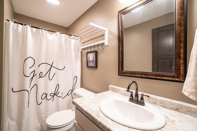 1115 Timber Path, Menomonie, WI 54751 - full bathroom with a textured wall, vanity, and curtained shower