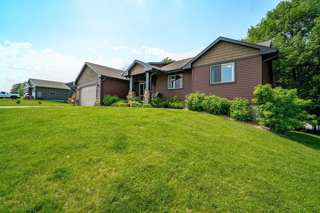 1115 Timber Path, Menomonie, WI 54751 - view of front of house with a front lawn and a garage