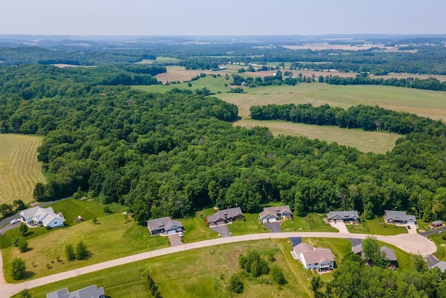 1115 Timber Path, Menomonie, WI 54751 - aerial view of property and surrounding area featuring a heavily wooded area