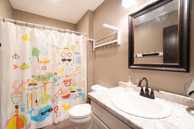 1115 Timber Path, Menomonie, WI 54751 - bathroom with vanity, a textured wall, and curtained shower
