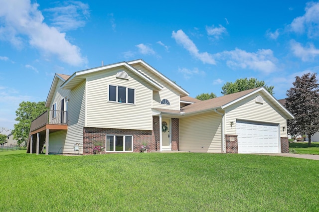205 4th St NW, Saint Michael, MN 55376 - tri-level home featuring brick siding, a garage, and a front yard